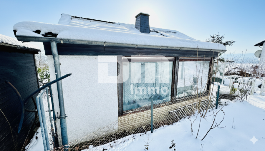 Umfangreich saniertes EFH inkl. PV-Anlage, Terrasse, Wintergarten und Garage + Panoramablick - Rückansicht